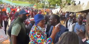 Maragua MP Mary Wamaua confronting security officers at Kasarani Stadium on December 10, 2021. 