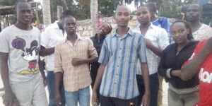 Vivo Energy Quality Marshall Balozi Chege (in blue stripped shirt) with his classmates during a class tour to Mombasa in October 2015.