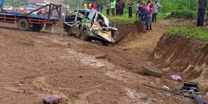 Grisly accident between Public Service Vehicle (PSV) and lorry at Kambiti along the Kenol-Makutano Road on Saturday, December 18.