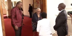 President-elect William Ruto (in black suit) meets outgoing President Uhuru Kenyatta (in maroon shirt) at State House on Monday, September 12, 2022.