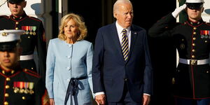 First lady Jill Biden (left) and President Biden await the arrival of Ukrainian President Volodymyr Zelensky at the White House in Washington, D.C. on Wednesday, December 21, 2022.
