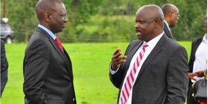 Deputy President William Ruto (left) speaks to former Bomet Governor Isaac Ruto at a past function.