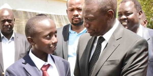 William Ruto with Sgt Kenei's Son 2