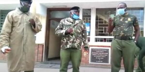 Police officers address reporters in Nakuru on May 24, 2020 after receiving donations from well-wishers