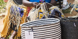 Women woving kiondo