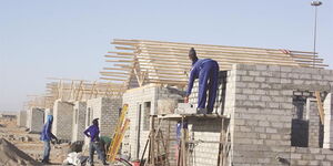 Workers pictured at a construction site.