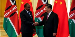 President Uhuru Kenyatta (left) meets Chinese Premier Xi Xingpin in Shanghai, China, during the FOCAC Summit on August 27, 2018.