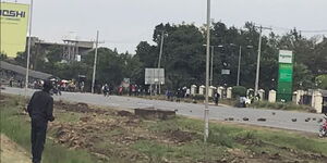 Youth scattered along Mombasa Road during protests on Wednesday, July 15, 2020.