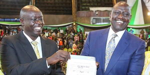 President-elect William Ruto and his running mate Rigathi Gachagua pose with his certificate the Bomas of Kenya on Monday, August 15, 2022.