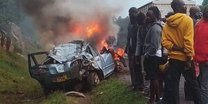 A personal vehicle engulfed with flames along the Kisumu- Kakamega Road on Thursday, September 18.