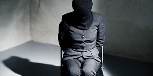 A photo of a hostage in detention.