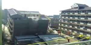 A photo of a five-storey building collapsing in Kariobangi South, Nairobi County