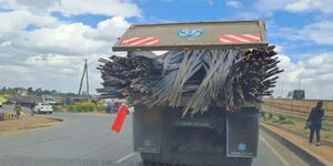 A photo of a truck on the road with protruding steel bars on May 31, 2023