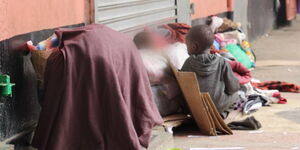 A photo of children sleeping on the streets of Nairobi