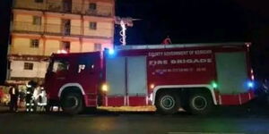 A photo of fire fighters in Kericho County at night onNovember 21, 2023