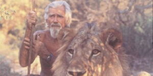 A photo of George Adamson with a lion in Kenya