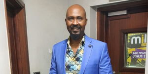 A photo of journalist Man Nyari at Kameme FM studios on October  2022