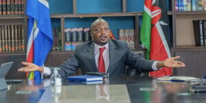 A photo of Public Service Cabinet Secretary Moses Kuria at his office