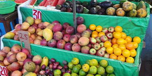 A photo of several fruits on display at a local market