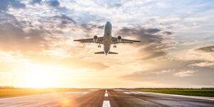 A plane taking off at an airport.