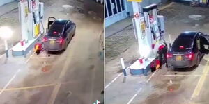 A screengrab of a petrol station employee being robbed at gun point