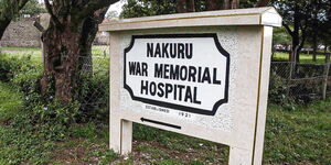 A signpost for the Nakuru War Memorial Hospital