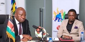 Sports Cabinet Secretary Ababu Namwamba (right) and delegates from the Ministry of Sports during the unveiling of Airing rights of AFCON 2023 at Talanta Hela Plaza on January 12, 2024. 