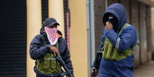 Masked police holding ammunition during the June protests 2024, Nairobi.