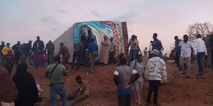 People surrounding a bus involved in an accident along the Thika-Garissa highway on Monday, September 29, 2025.