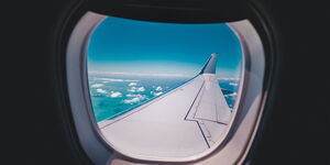 An undated photo of a airplane window.