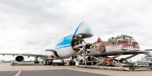 A photo of Kenyan vegetables being loaded to cargo plane for export.