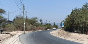 An electric pole at the middle of Maasai Lodge-Rimpa Road.