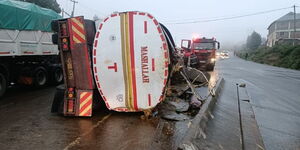 An overturned truck along Nakuru - Nairobi Highway.