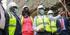 PS for Housing and Urban Development, Charles Hinga and acting governor Nairobi County Ann Kananu, being shown around the Pangani housing project.