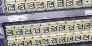 Arimis milking jelly on shelves in a supermarket.