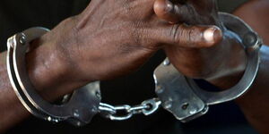 A suspect in handcuffs