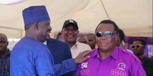Azimio's Raila Odinga shakes hands with COTU boss Francis Atwoli during a funeral ceremony of a COTU official in Vihiga County on September 2, 2023. 