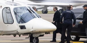 A photo of Billionaire Bill Gates boarding a plane in the US at a past event.