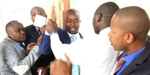 Scenes during a fight between Charles Njagua (left) and Babu Owino (far right)