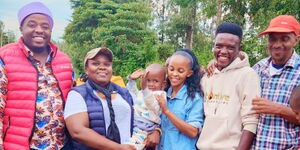From left: Musician Karangu Muraya,  Former Kasarani Member of Parliament Mercy Wanjiku (carrying Ethan), and the three-year-olds parents.