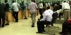 Kenyans waiting to be served at a bank's teller points.