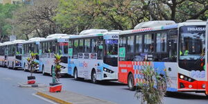 A fleet of BasiGo electric buses along Moi Avenue in Nairobi County.