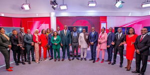 Former KTN sports news Anchor Ahmed Bahajj (second left) and other TV47 news anchors posing for a photo alongside CS Eliud Owalo and Bungoma Governor Kenneth Lusaka during the launch of the studios in October 2023.