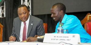 From left to right: President Uhuru Kenyatta and KNUT Secretary General Wilson Sossion.
