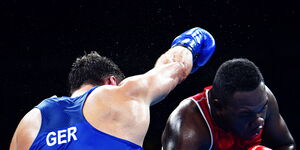 A file image of boxers during a match in a ring