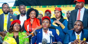 Brenda Majune (centre), UDA Secretary General Cleophas Malala (right) and UDA members at a press briefing on March 15, 2023