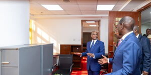 President William Ruto (right) chatting with Senate Speaker Amason Kingi at Bunge Towers 