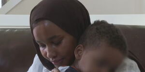 Halima Abdi and her youngest son, two-year-old Mubarak.