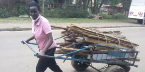 Caren Ochieng pulling a cart in Nairobi in June 2023