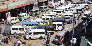 Matatus wait for passengers on Accra road in downtown Nairobi.